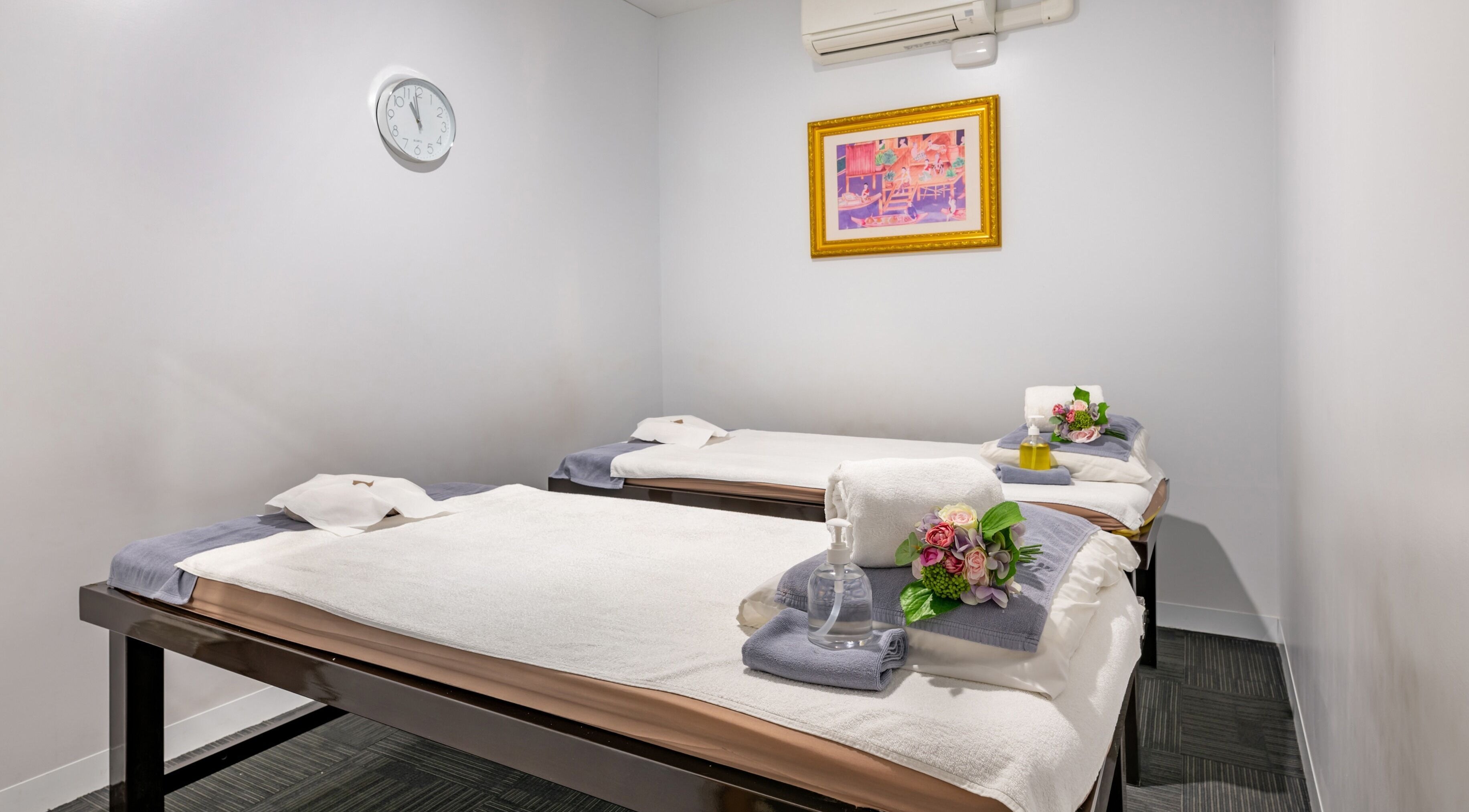 Relaxing massage room at Vigorous Thai - Moonee Ponds, Moonee Ponds, Victoria, AU, with two treatment beds.