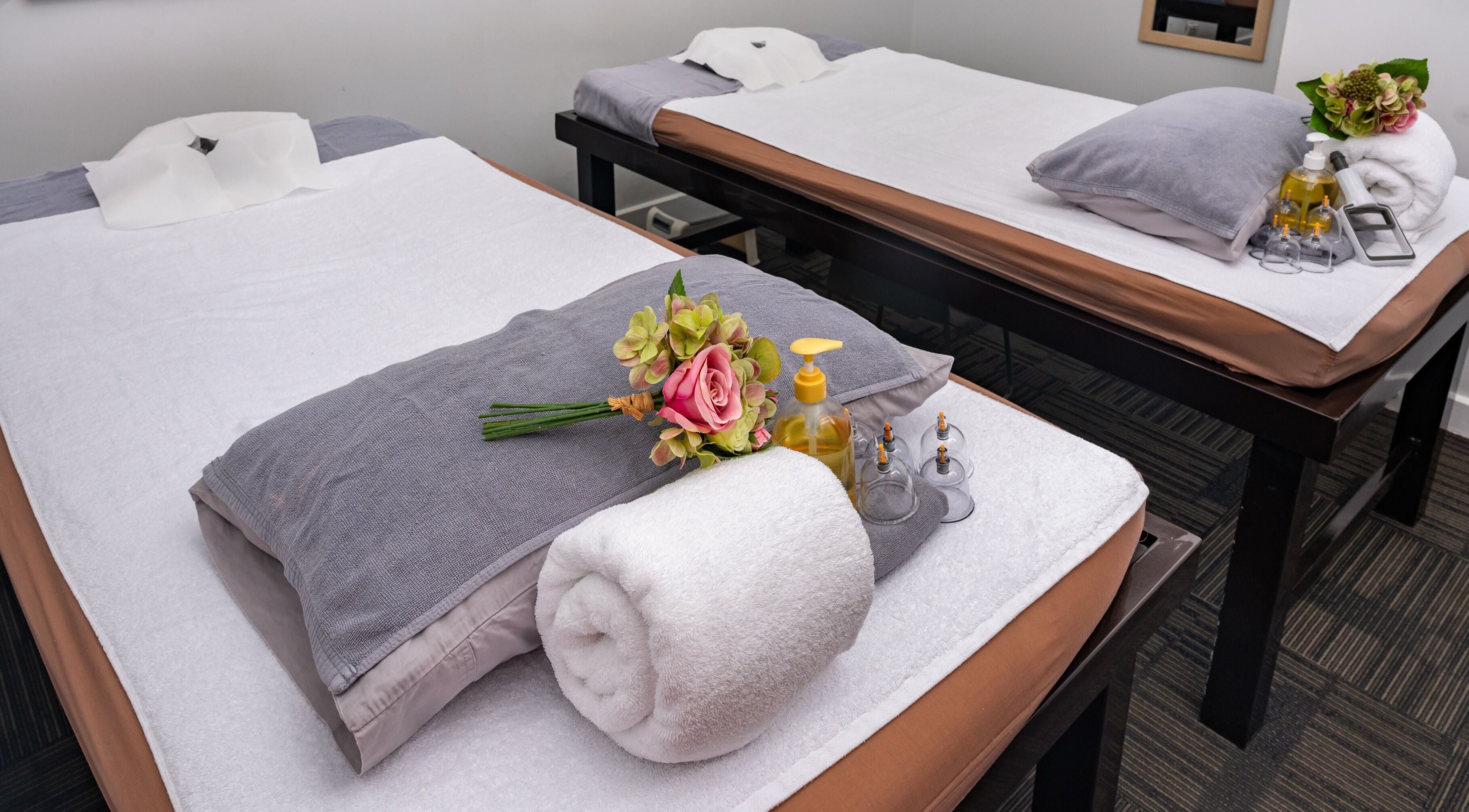 Relaxing treatment room at Vigorous Thai - Bourke Street, Melbourne, Victoria, AU with massage tables.