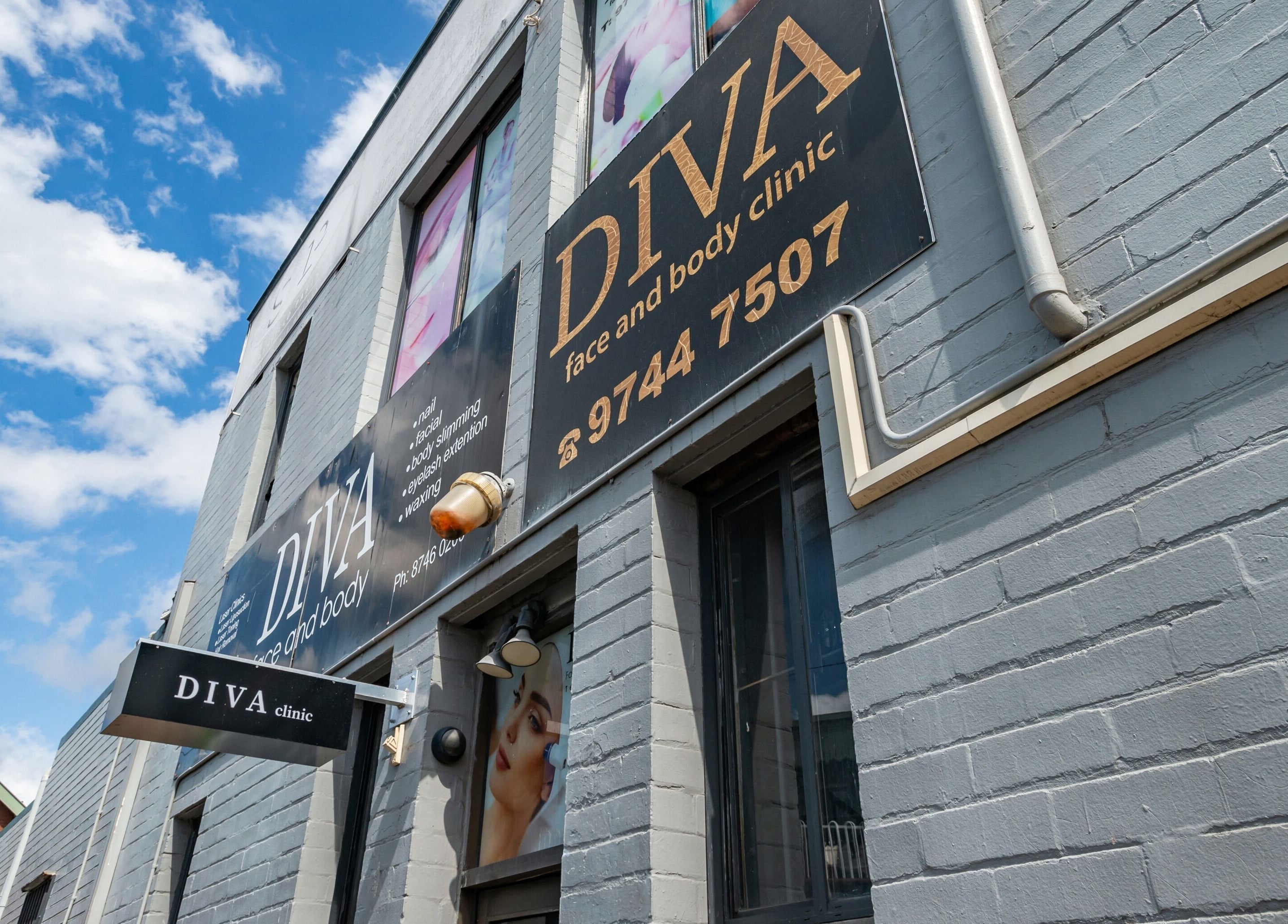 Exterior view of Diva Face and Body Clinic in Strathfield, New South Wales, AU, showcasing signage and brickwork.