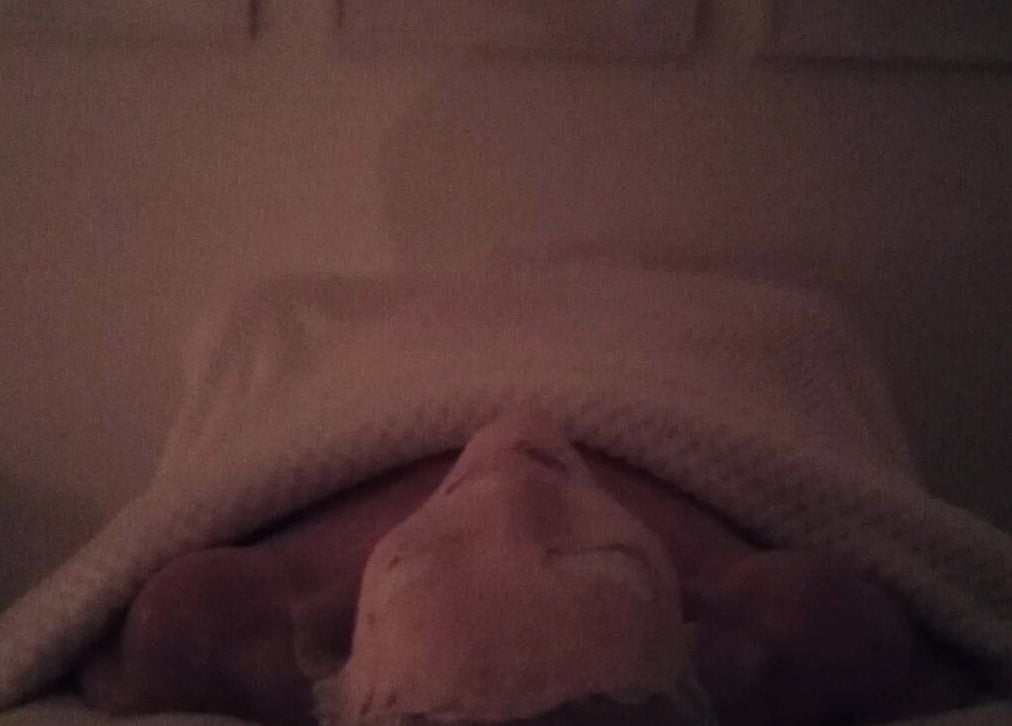 Tranquil spa setting at Earth & Tonic, Yanchep, Western Australia, AU, showing a person wrapped in a cozy blanket.