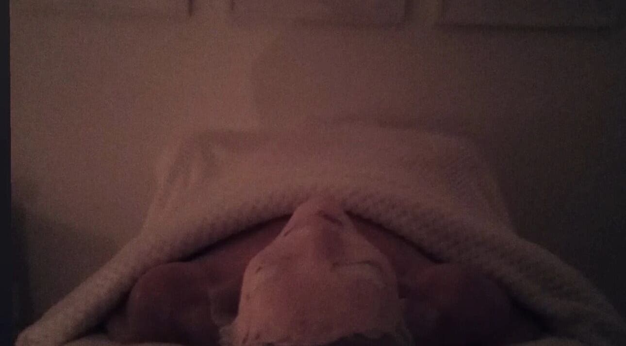 Tranquil spa setting at Earth & Tonic, Yanchep, Western Australia, AU, showing a person wrapped in a cozy blanket.