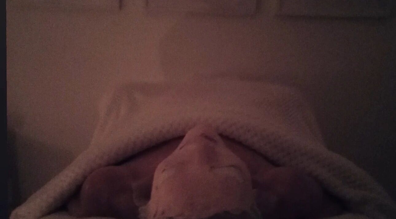 Tranquil spa setting at Earth & Tonic, Yanchep, Western Australia, AU, showing a person wrapped in a cozy blanket.