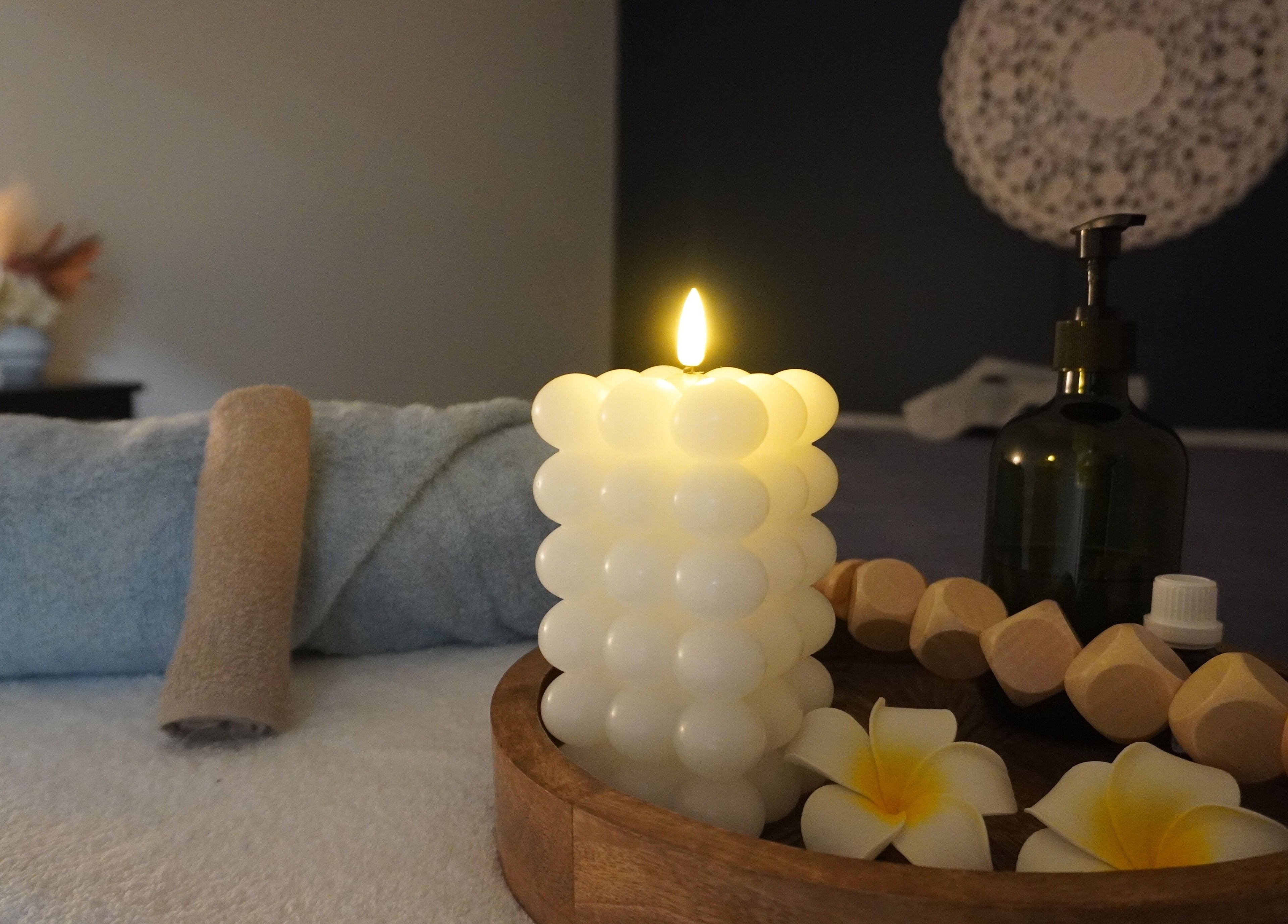 Relaxing spa setup at Jaywa Wellness Centre Dubbo, featuring candle and flowers in Dubbo, New South Wales, AU.