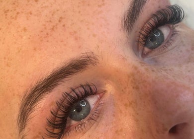 Close-up of styled eyelashes and freckled skin at Maisy’sBeautyBarn, Headcorn, England, GB.