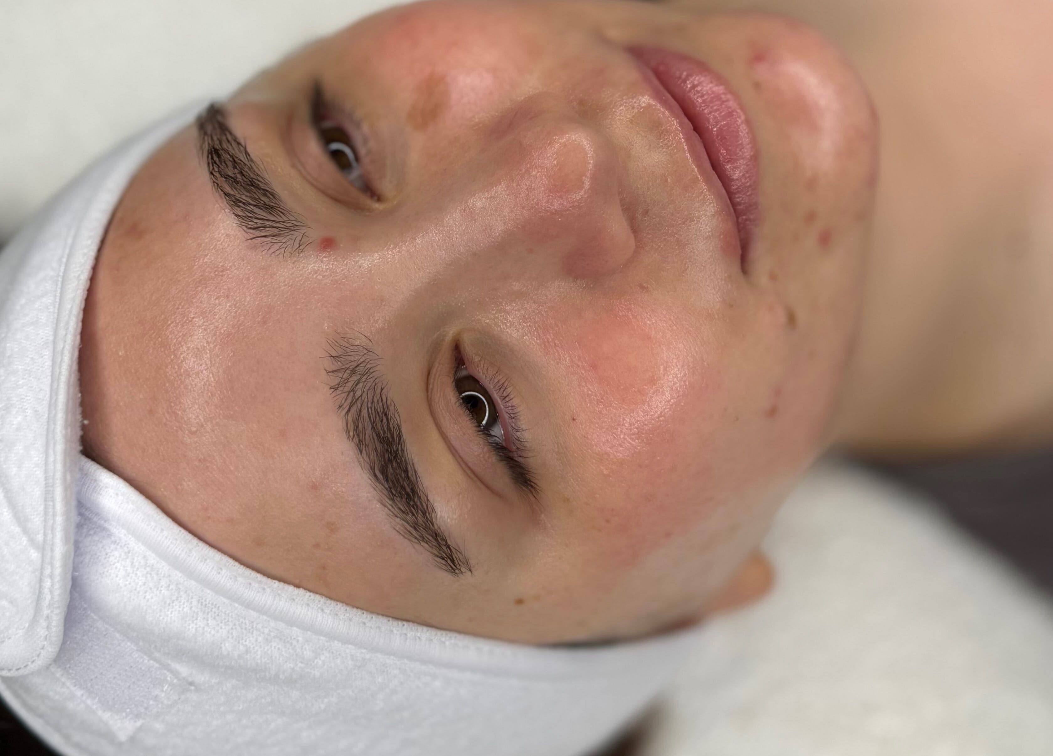 Close-up of a relaxed face after skincare at Bare Beauty by Vici in Andover, England, GB.