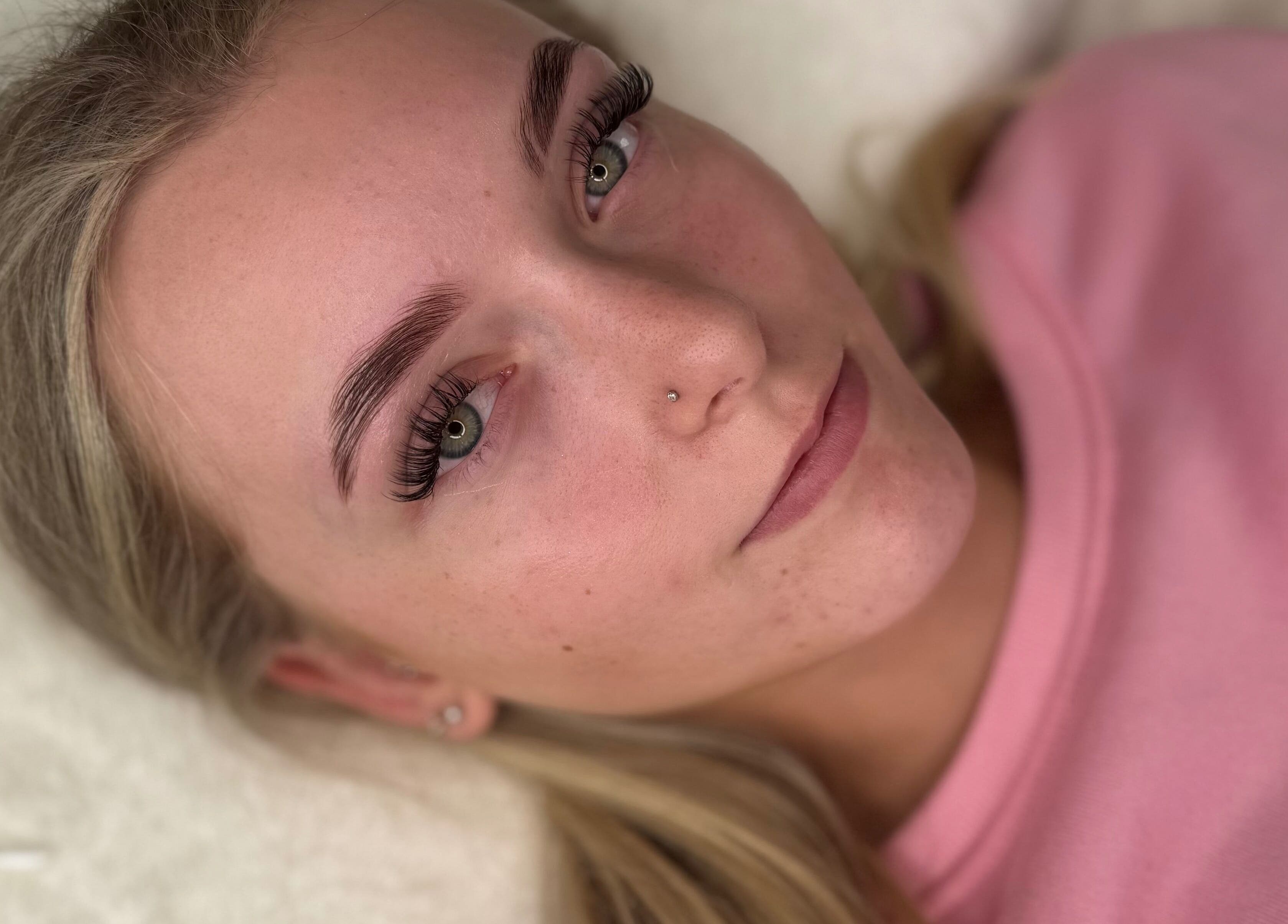 Client with elegant eyelash extensions at Bare Beauty by Vici, Andover, England, GB.