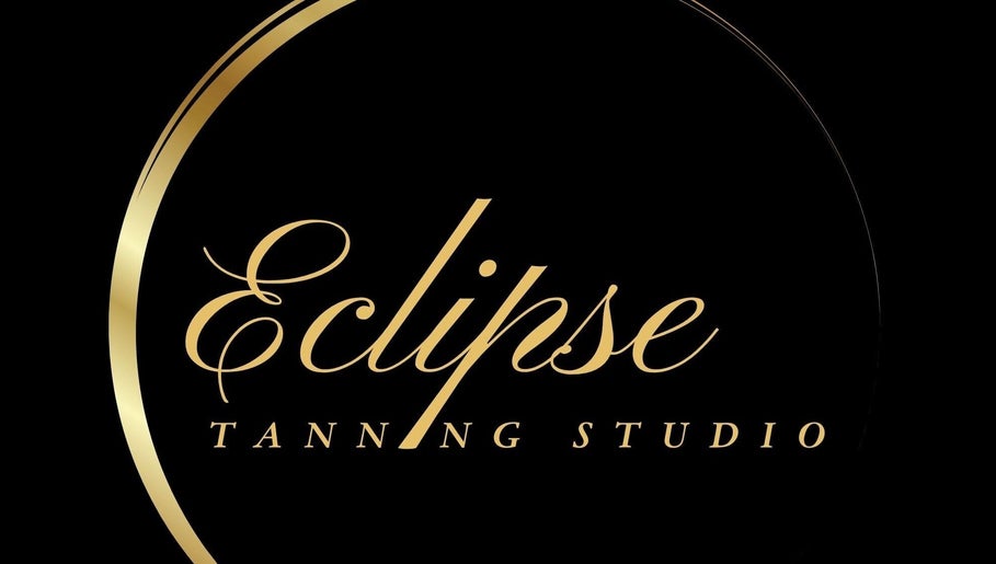Eclipse Tanning Studio logo in gold lettering, located in Launceston (Anglia), Cornwall, GB.