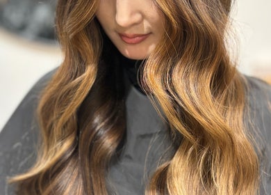 Stylish brown waves at V•Hair Studio ByVera in Melbourne, Victoria, AU, showcasing expert hair styling.
