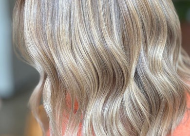 Elegant blonde waves at V•Hair Studio ByVera, Melbourne, Victoria, AU. Perfect for contemporary hair styling.