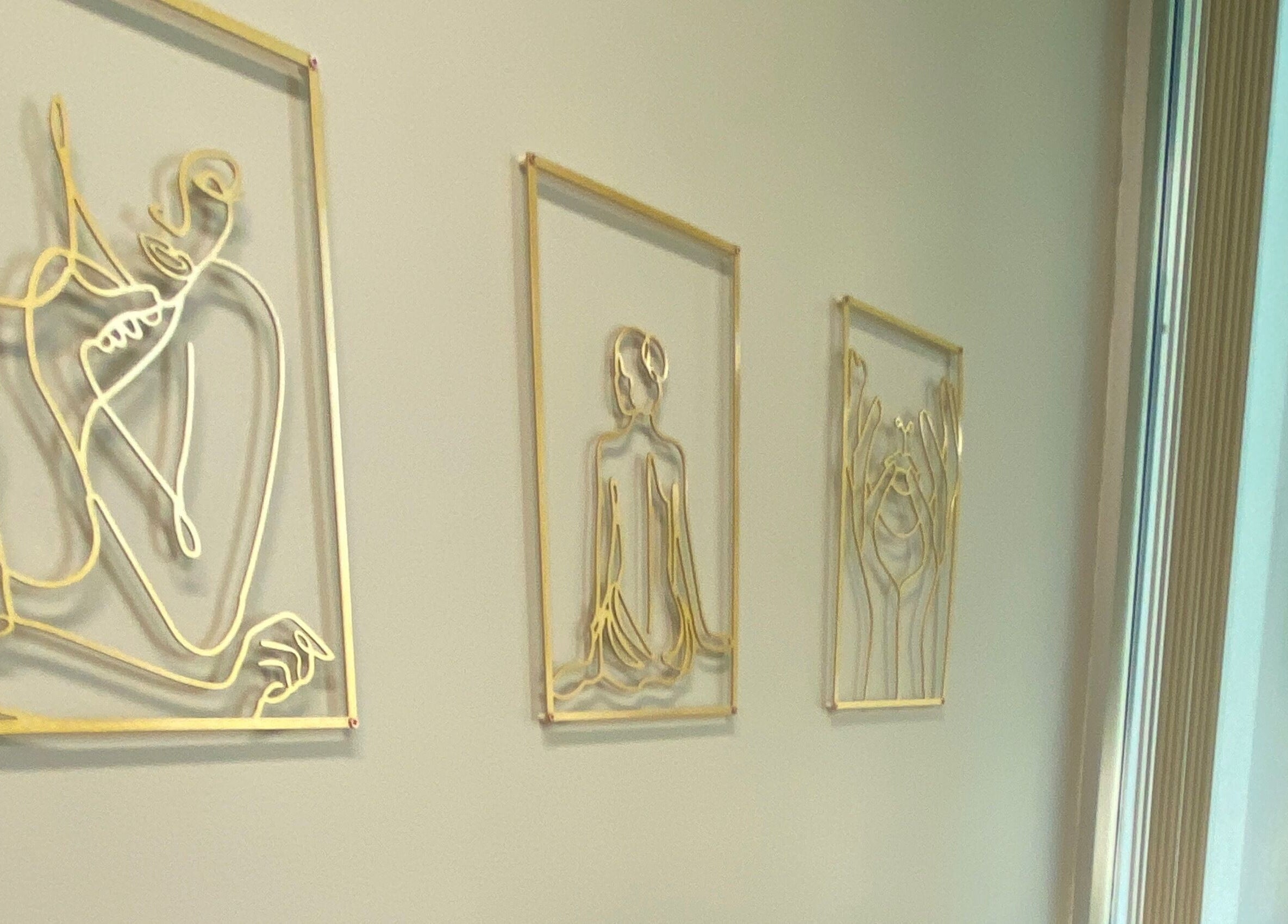 Elegant wire art on display at Bonita Hub, Rolling Meadows, Illinois, US, enhancing a serene wellness ambiance.