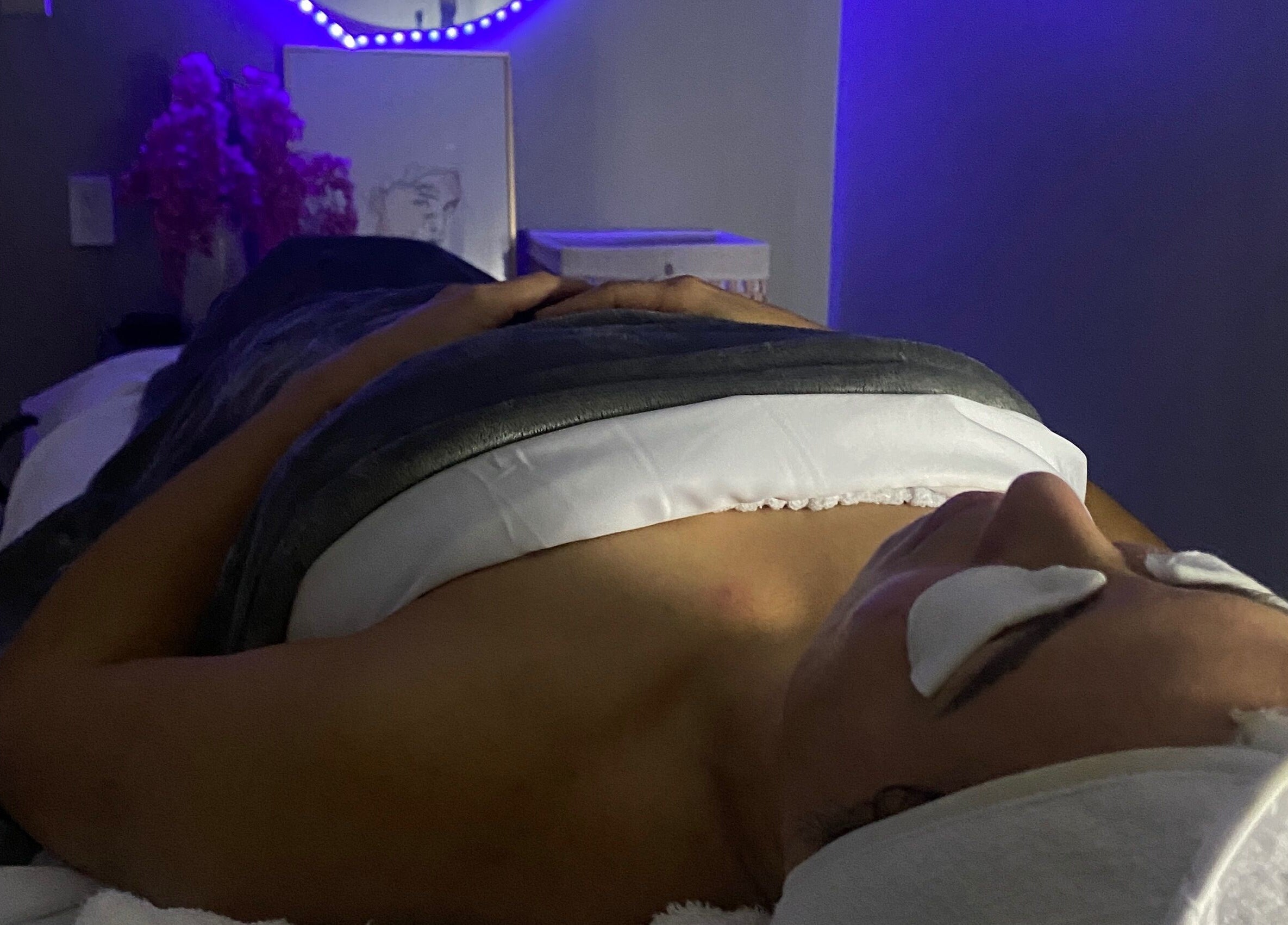 Client relaxing during a rejuvenating treatment at Bonita Hub, Rolling Meadows, Illinois, US.