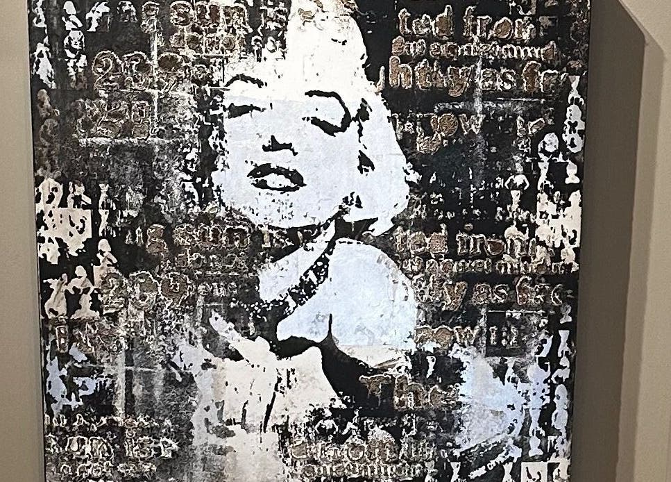 Decorative wall art at Couture Hair Studio & Spa, Mitchell, Ontario, CA, enhancing the salon's ambiance.