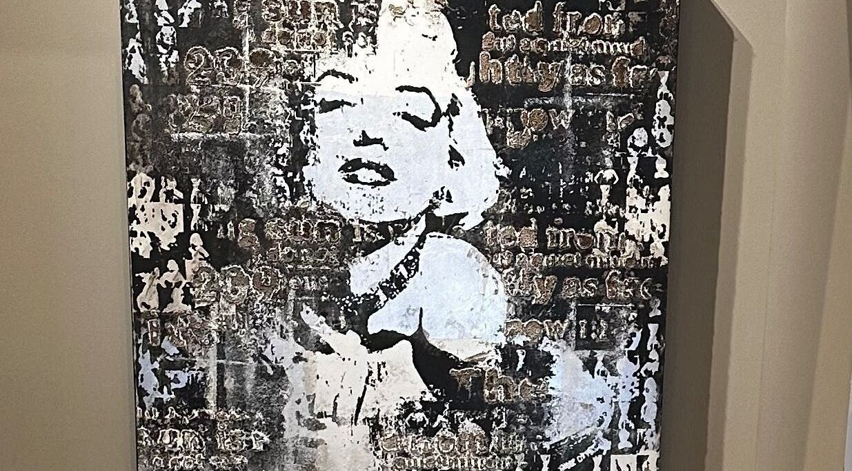 Decorative wall art at Couture Hair Studio & Spa, Mitchell, Ontario, CA, enhancing the salon's ambiance.