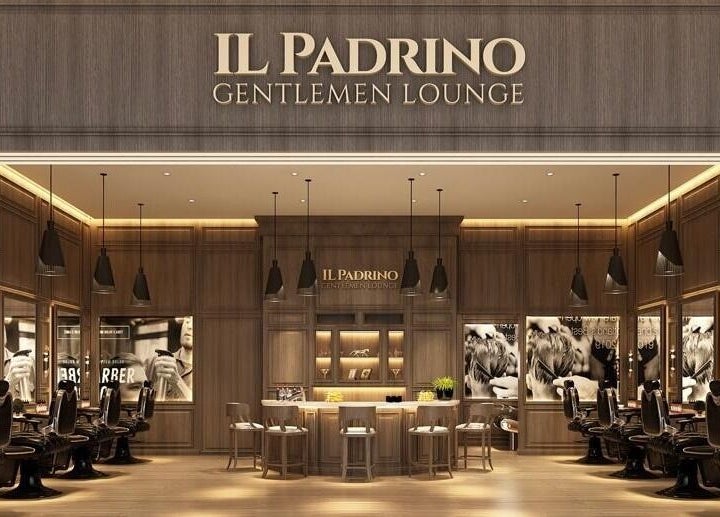 Il Padrino Gentlemen Lounge - Meadows Village, Dubai, AE. Elegant barbershop interior with stylish seating.
