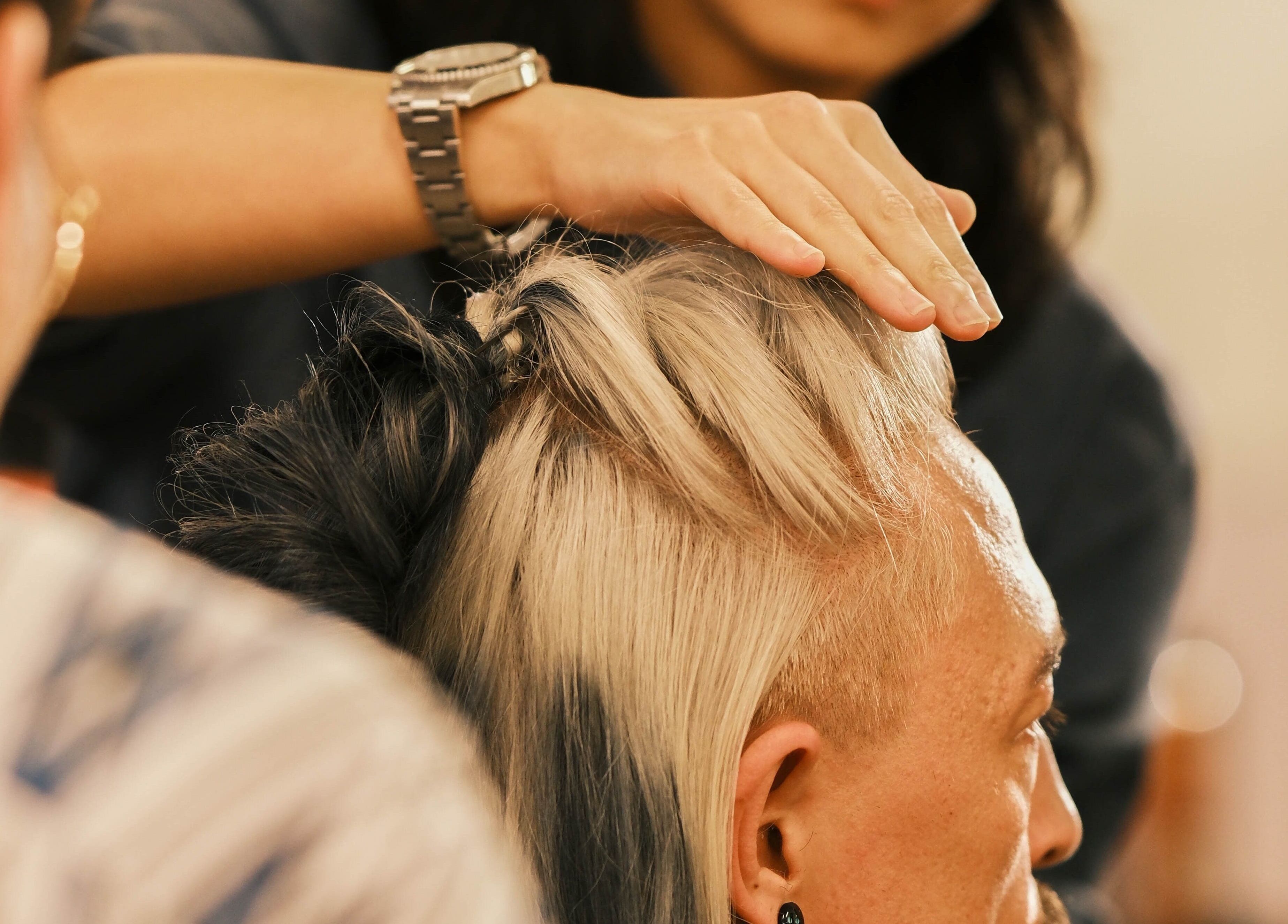 Professional hairstyling at Coffee Ng, 香港島, 香港島, HK, showcasing modern grooming techniques.