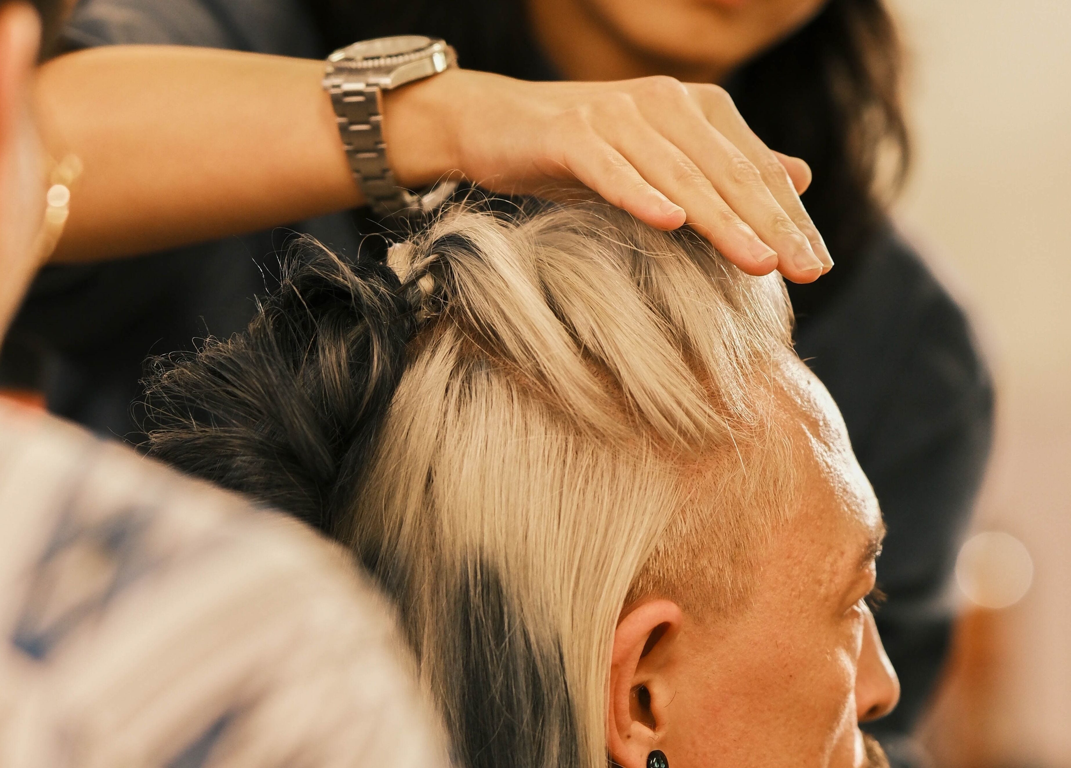 Professional hairstyling at Coffee Ng, 香港島, 香港島, HK, showcasing modern grooming techniques.
