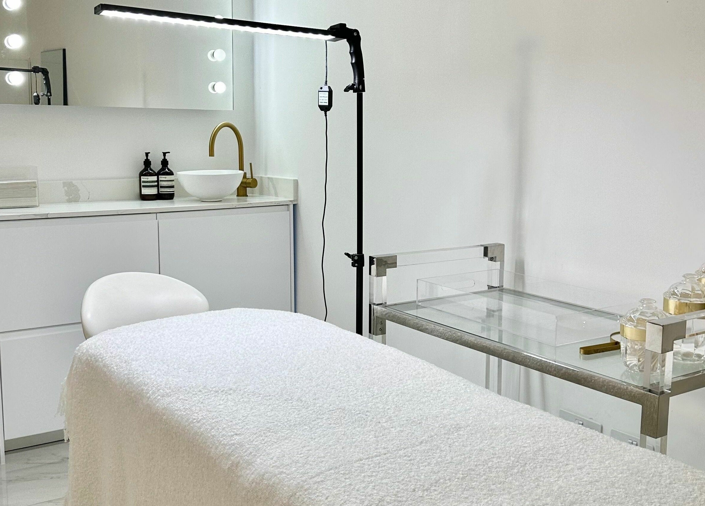 Relaxing treatment room at Pout in Whitefield, England, GB with stylish decor and modern amenities.
