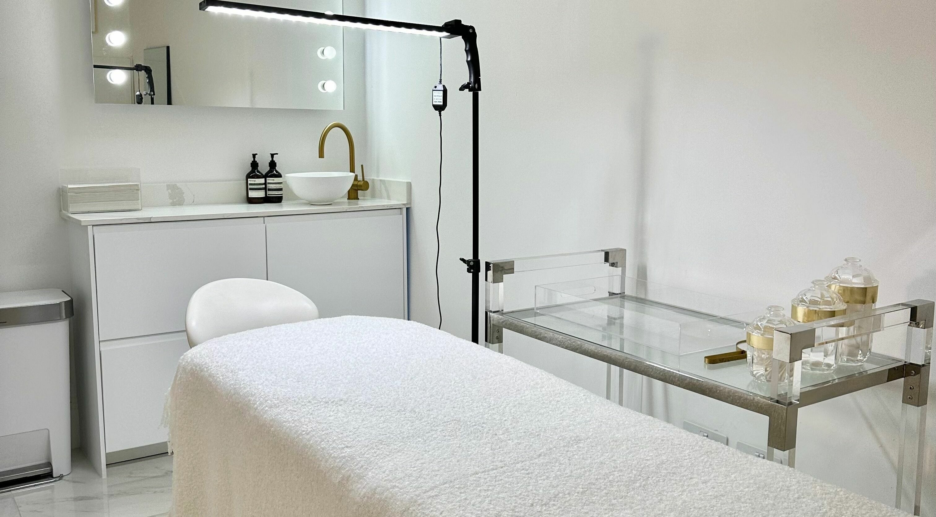 Relaxing treatment room at Pout in Whitefield, England, GB with stylish decor and modern amenities.