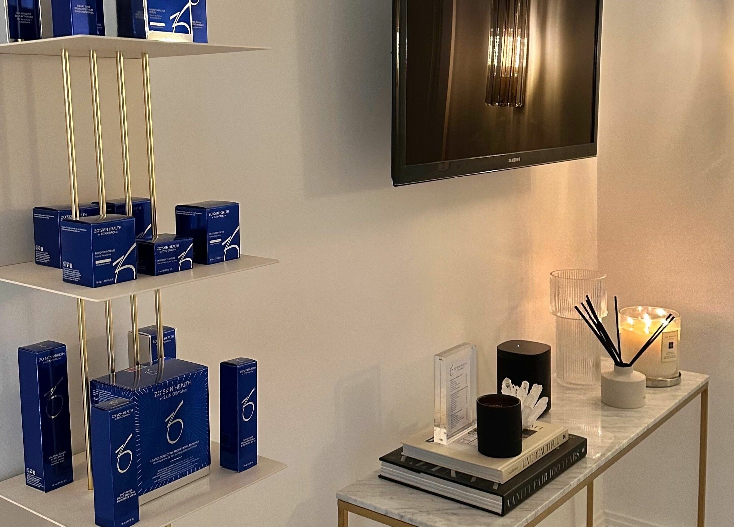 Sleek skincare display at Pout, Whitefield, England, GB, featuring premium products and ambient lighting.