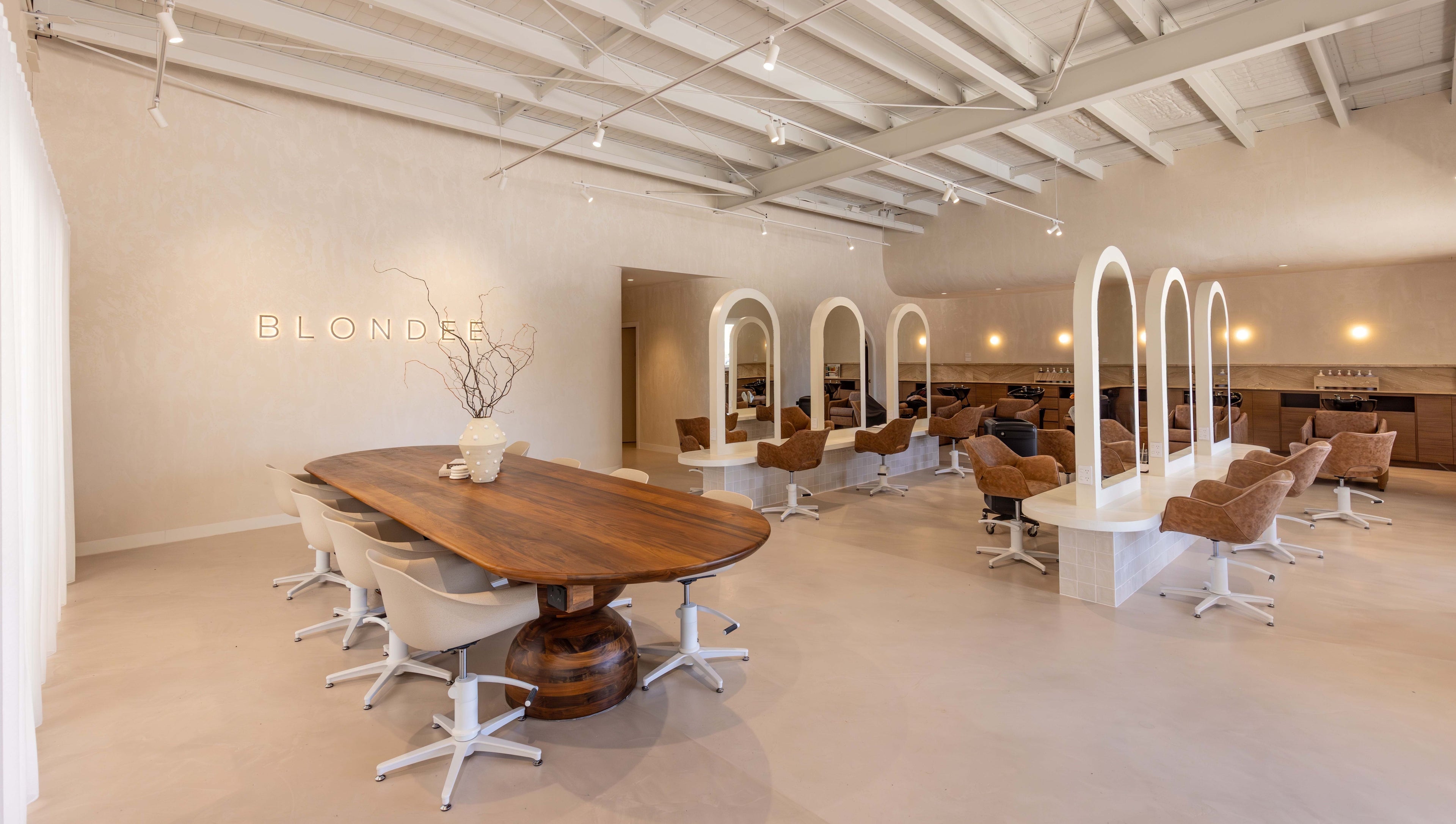 Blondee | Burleigh salon in Burleigh Waters, Queensland, AU, showcasing chic modern design and comfortable styling chairs.