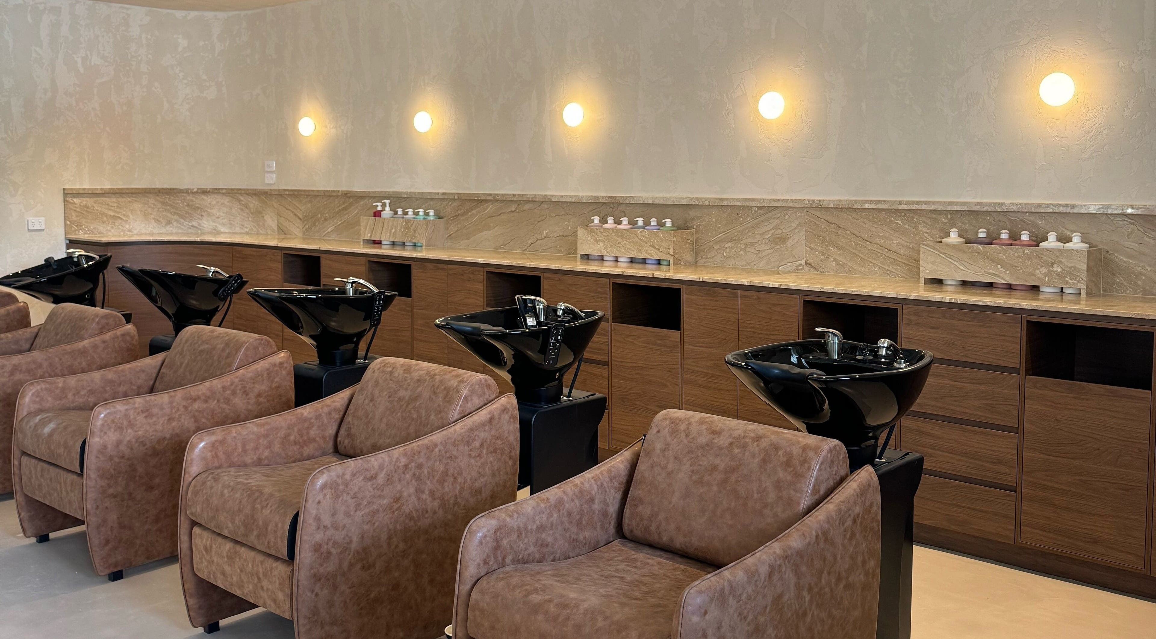 Stylish wash stations at Blondee | Burleigh, Burleigh Waters, Queensland, AU in luxurious salon setting.