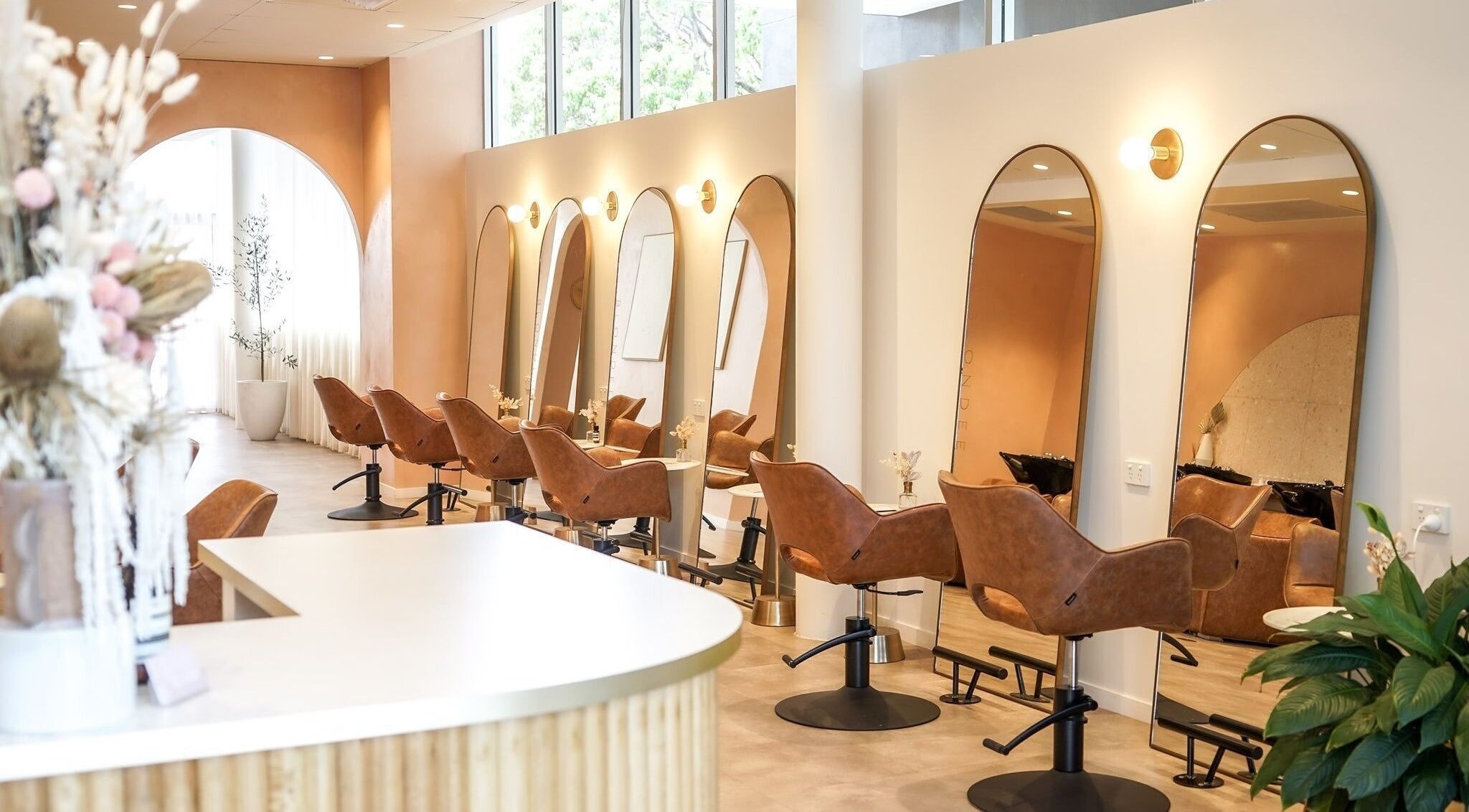 Chic interior of Blondee | Morningside salon, featuring stylish chairs and mirrors in Morningside, Queensland, AU.