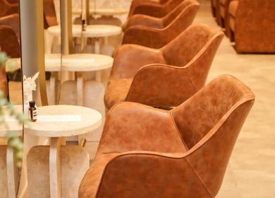 Elegant leather chairs line the interior of Blondee | Morningside in Morningside, Queensland, AU salon.