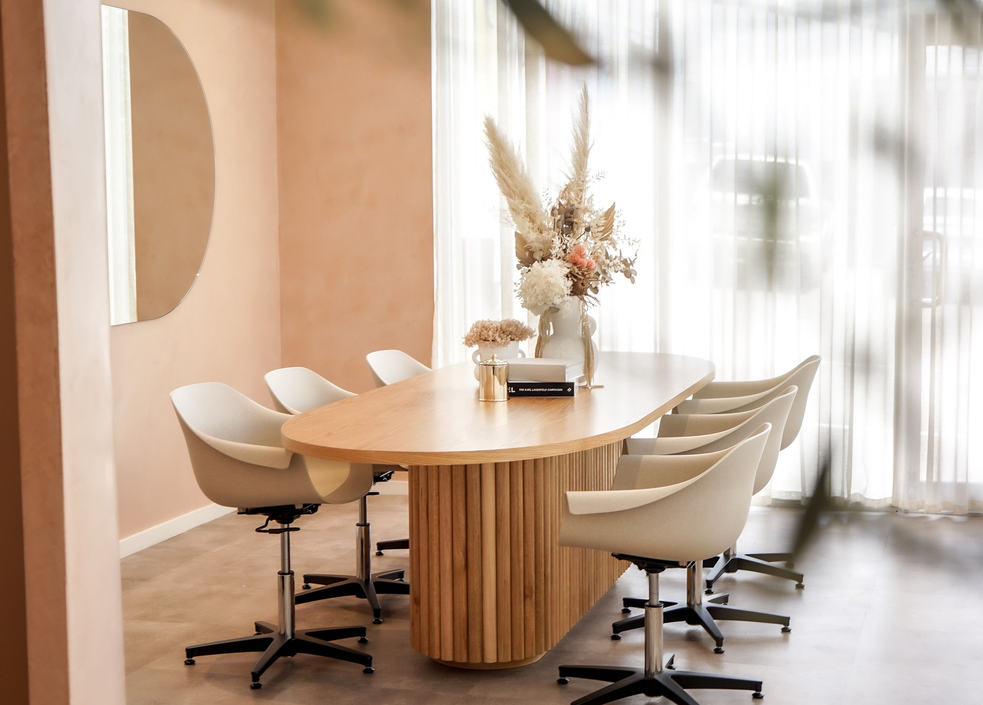 Stylish interior at Blondee | Newstead featuring a modern table and chairs in Newstead, Queensland, AU.