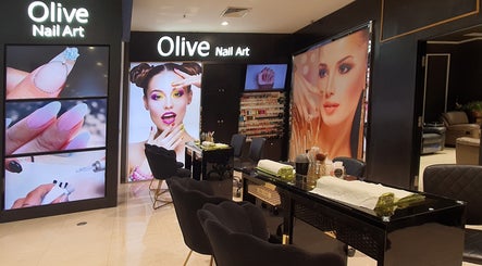 Interior of Olive Nail Art Plaza Senayan in Daerah Khusus Ibukota Jakarta, featuring modern nail art displays.