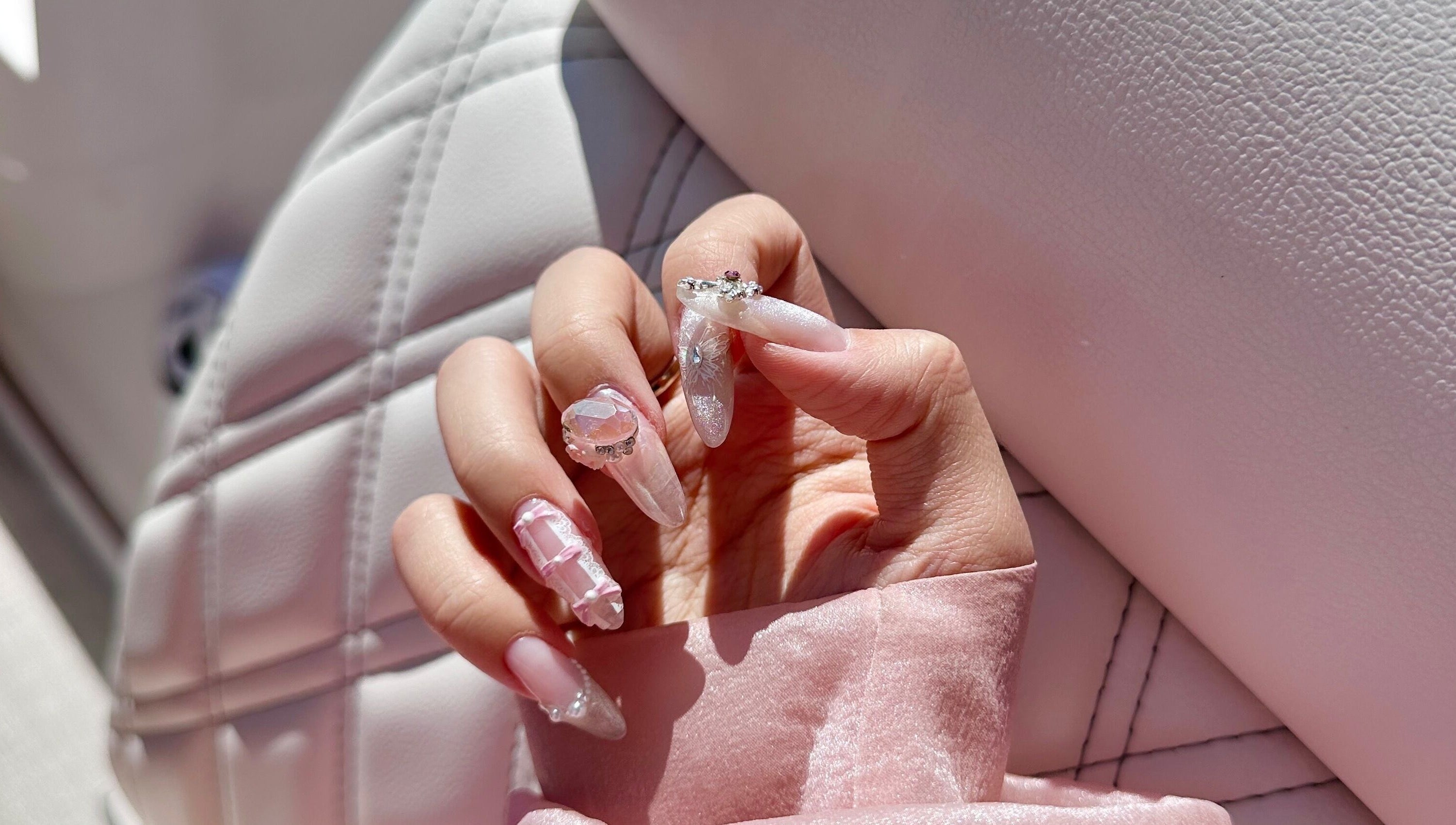 Elegant, jeweled manicure at Tipsy By Lexie in Montréal, Québec, CA showcasing intricate nail designs.