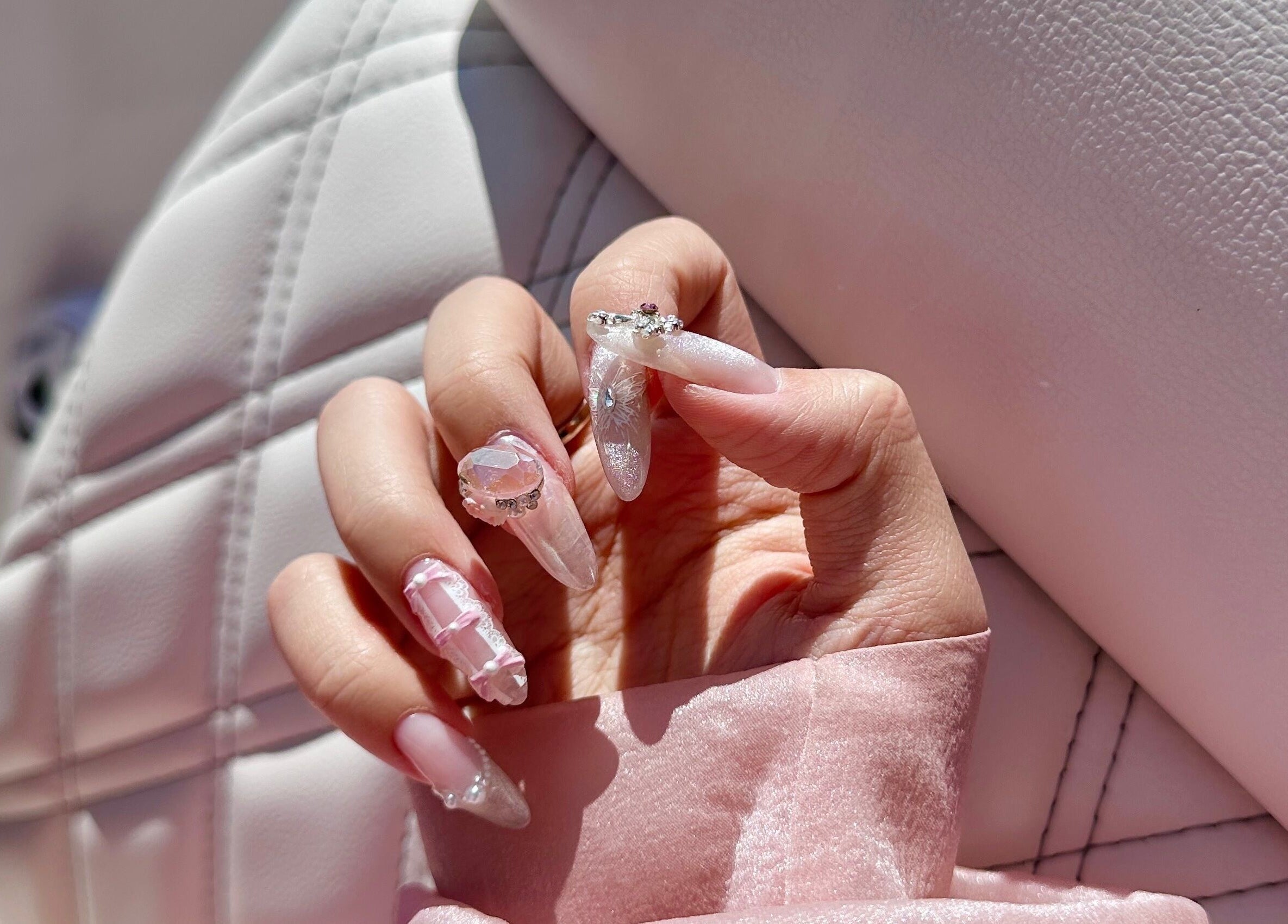 Elegant, jeweled manicure at Tipsy By Lexie in Montréal, Québec, CA showcasing intricate nail designs.