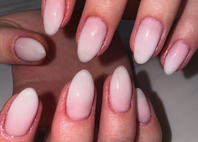 Stylish gel nails at Lenails Beauty Salon in Krugersdorp, Gauteng, ZA offer a sleek, modern look.