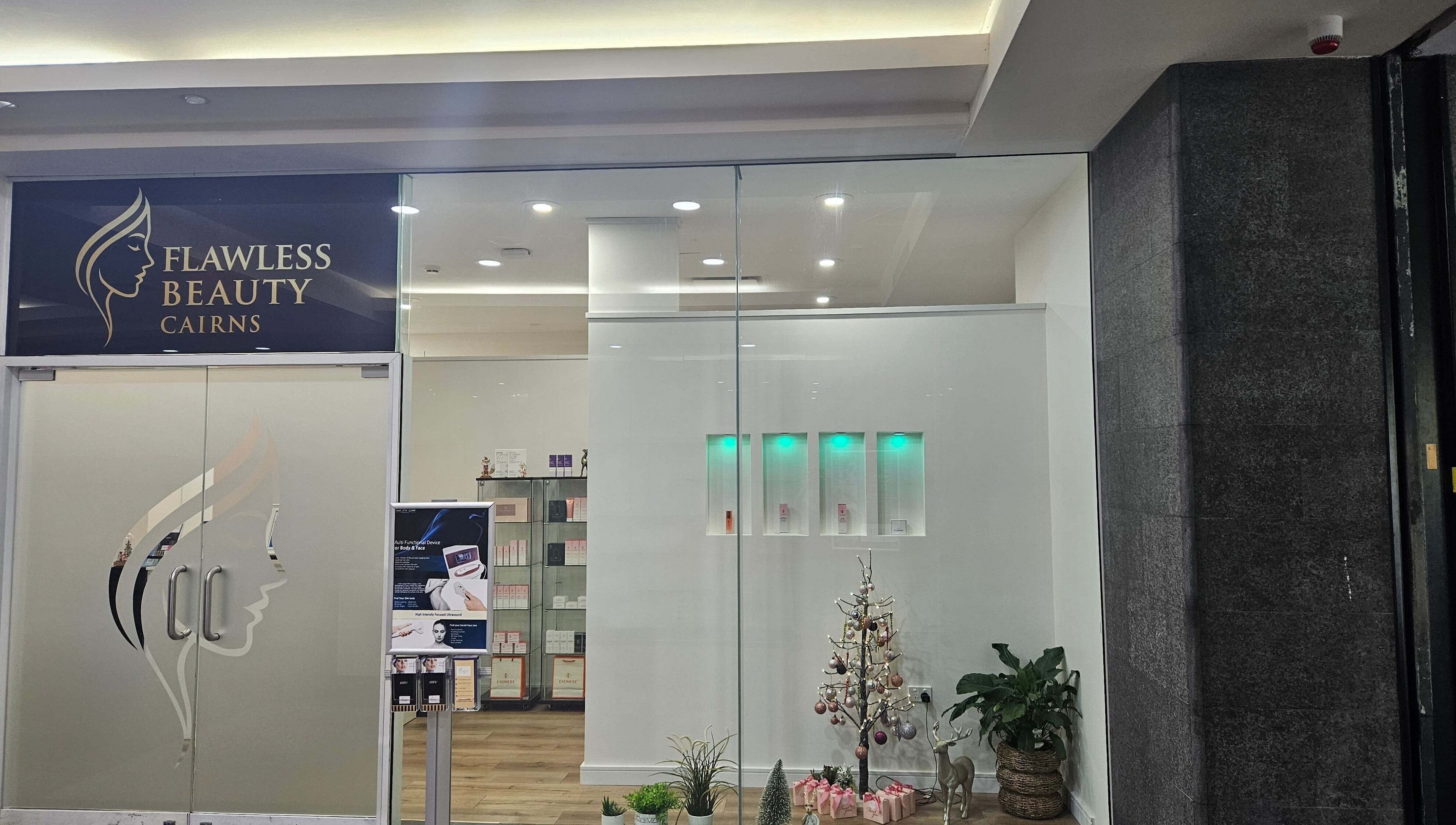 Entrance to Flawless Beauty Cairns in Cairns City, Queensland, AU, showcasing modern decor and welcoming ambience.