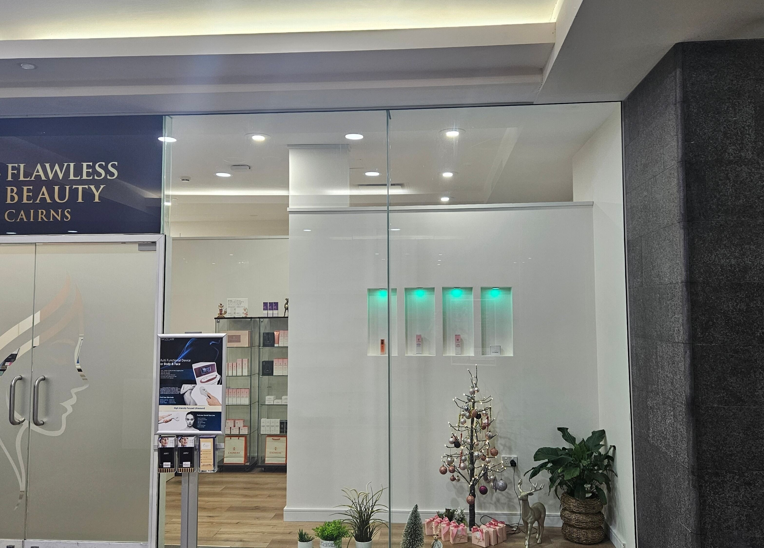 Entrance to Flawless Beauty Cairns in Cairns City, Queensland, AU, showcasing modern decor and welcoming ambience.