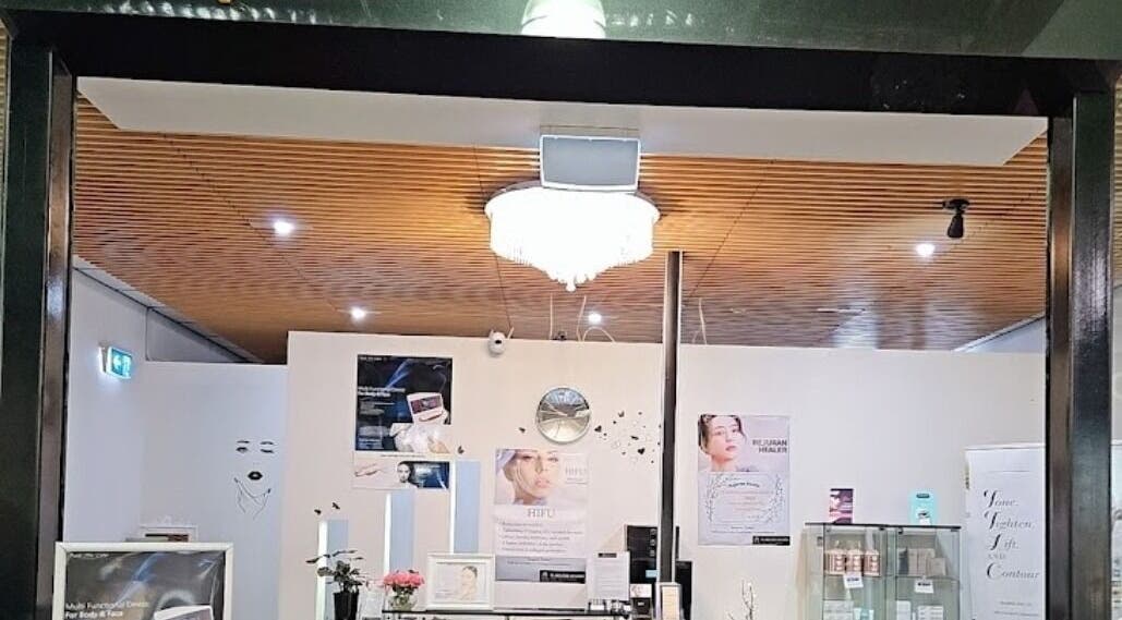 Welcoming entry of Flawless Beauty Cairns, located in Cairns City, Queensland, AU, featuring elegant decor.