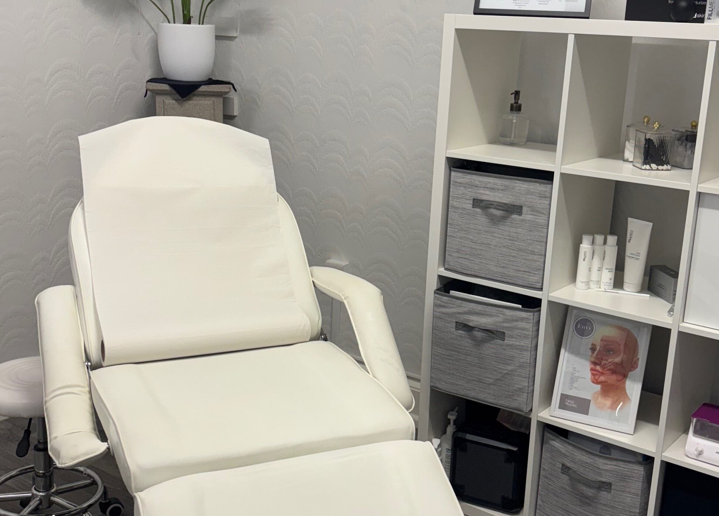 Relaxing treatment room at Sugar Studio, Envi Clinic, Ballyclare, Northern Ireland, GB, featuring a comfortable chair.