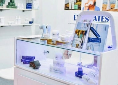 Product display at Euphrates Wellness Clinic -Monument Park, Centurion, Gauteng, ZA. Skincare items on glass shelf.