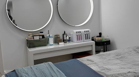 Stylish treatment room at South Nail & Beauty Studio, Glasgow, Scotland, GB with mirrors and beauty products.