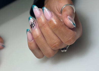 Stylish nails with blue accents at South Nail & Beauty Studio, Glasgow, Scotland, GB.