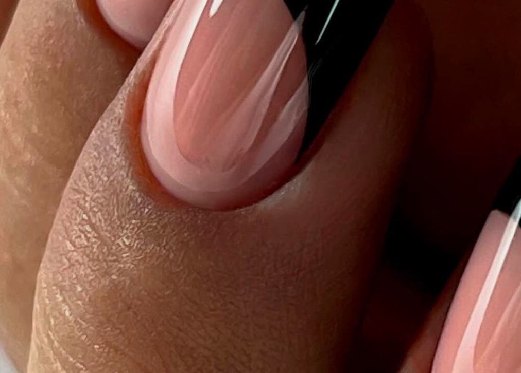 Elegant black-tipped nails at NAVY NAIL HAIR BEAUTY STUDIO in Glasgow, Scotland, GB.