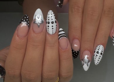 Elegant black and white nail art design at Flo’s Beauty, Thurmaston, England, GB.