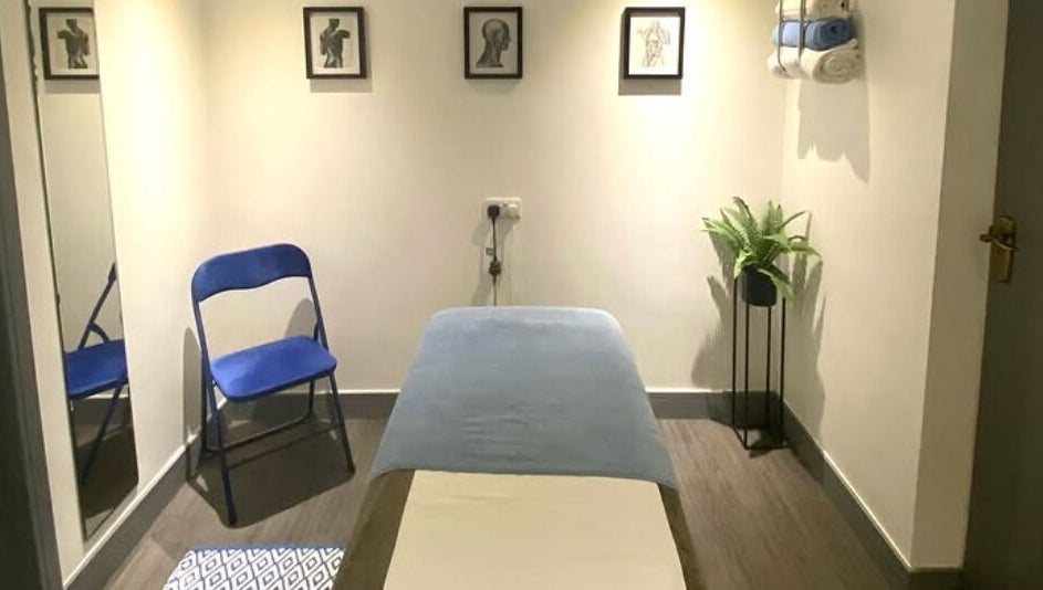 Peaceful treatment room at Re Balance, Redditch, England, GB with massage bed and calming decor.