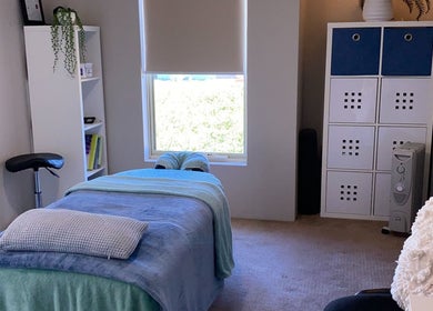 A serene massage room at CQ Massage Therapy, City Of Wanneroo, Western Australia, AU, featuring a cozy treatment bed.
