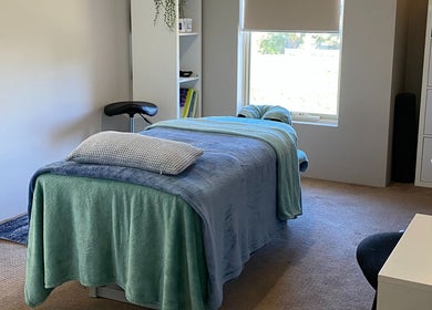 Relaxing therapy room at CQ Massage Therapy, City Of Wanneroo, Western Australia, AU, with a massage bed.