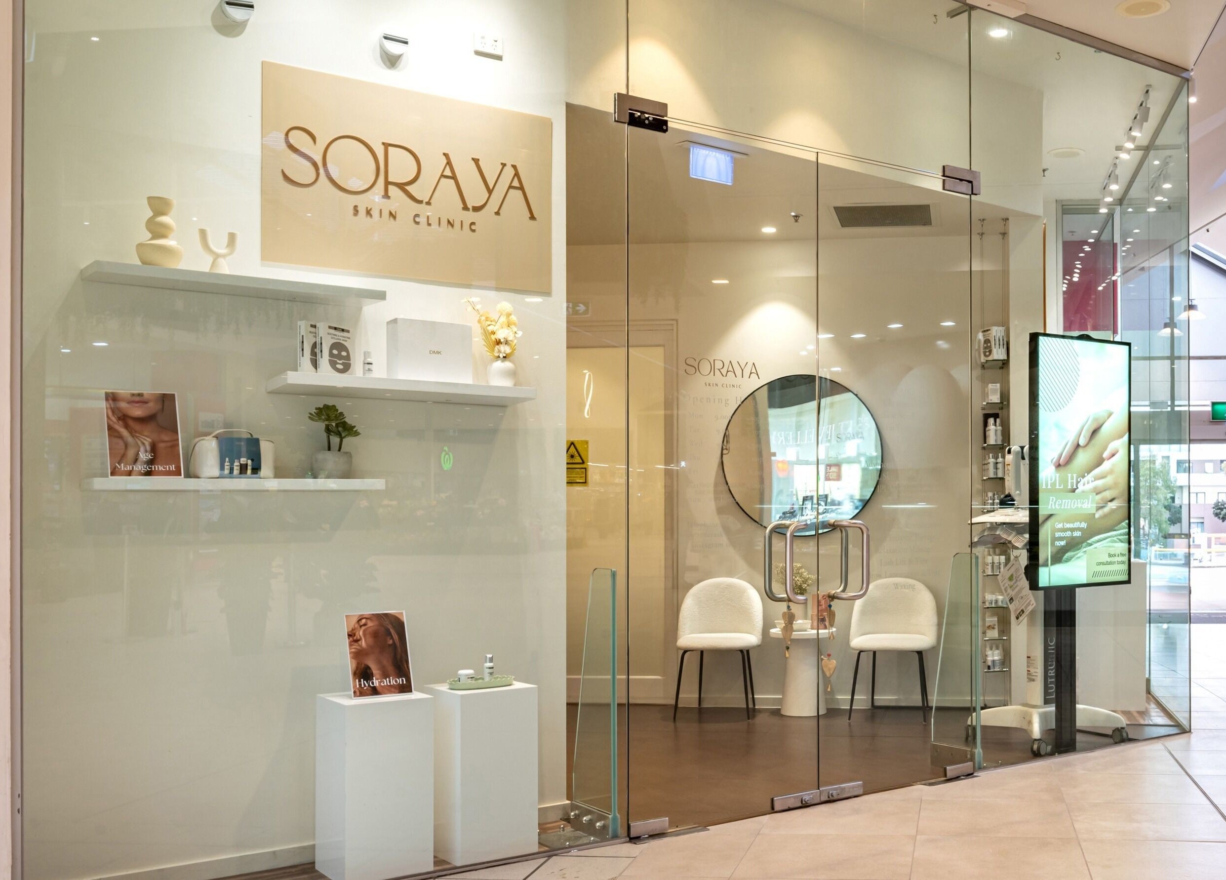 Entrance of Soraya Skin Clinic Doncaster East, featuring glass doors and stylish interior, Doncaster East, Victoria, AU.