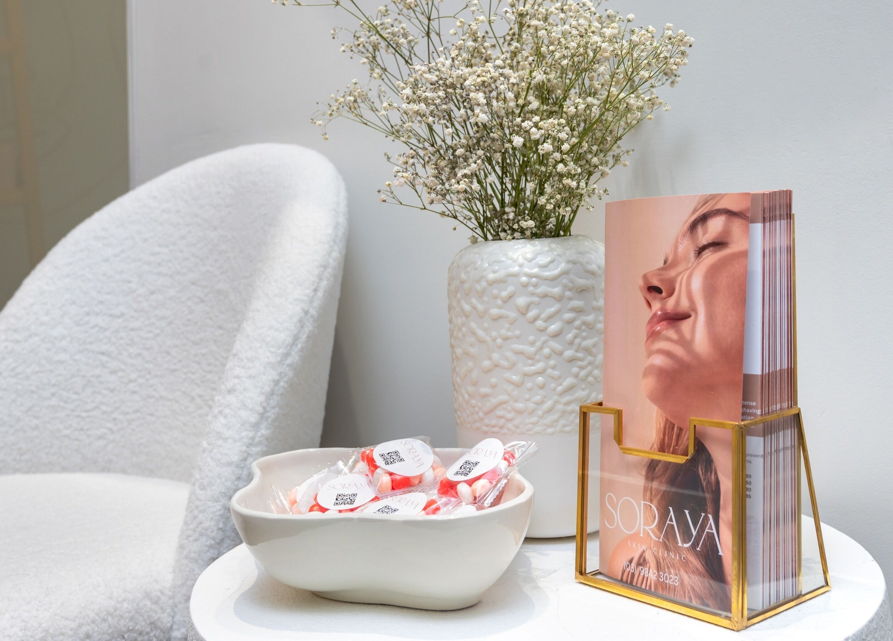 Elegant reception area at Soraya Skin Clinic Doncaster East with brochures and decor in Doncaster East, Victoria, AU.