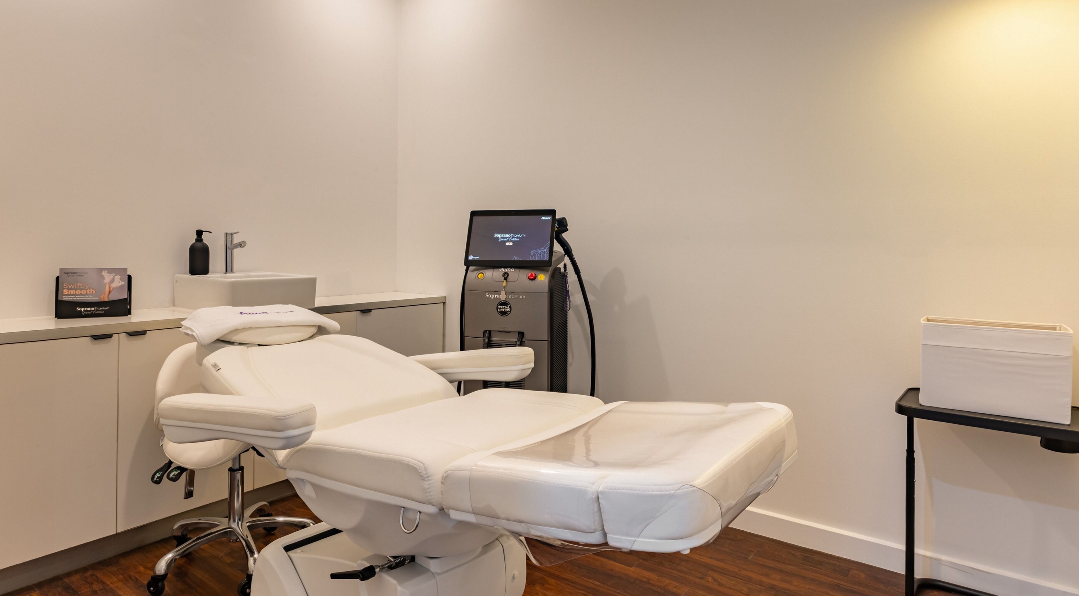 Modern treatment room at Soraya Skin Clinic Prahran, Victoria, AU featuring a sleek medical chair and equipment.