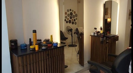 Modern salon interior at Barber Shop Labi, Prishtina, XK, showcasing well-organized grooming products.