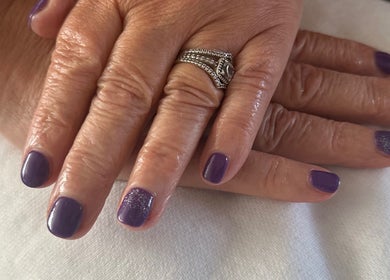 Elegant purple nails manicure at K&R Hair & Nails, Lancaster, England, GB.