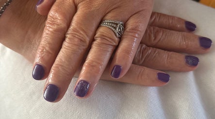 Elegant purple nails manicure at K&R Hair & Nails, Lancaster, England, GB.